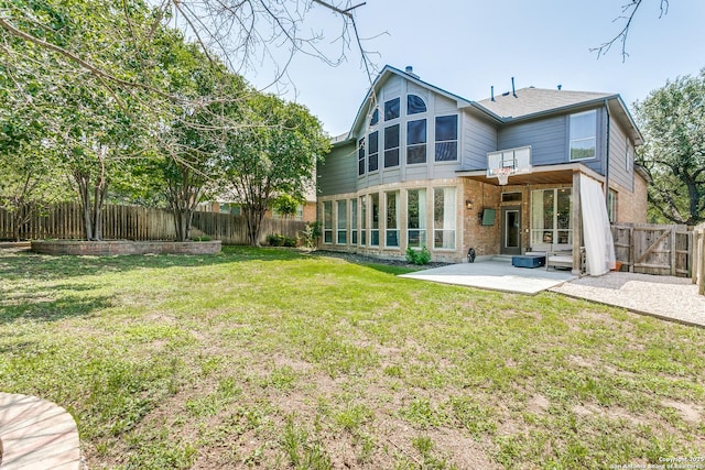 823 Peg Oak, San Antonio, TX 78258 - rear view of house featuring brick siding and a patio area