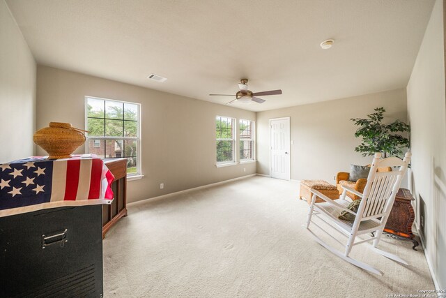 38 Atwell, San Antonio, TX 78254 - living area featuring baseboards, ceiling fan, and light carpet