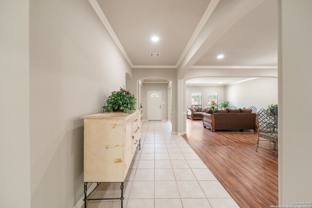38 Atwell, San Antonio, TX 78254 - entryway featuring arched walkways, ornamental molding, light tile patterned flooring, recessed lighting, and baseboards