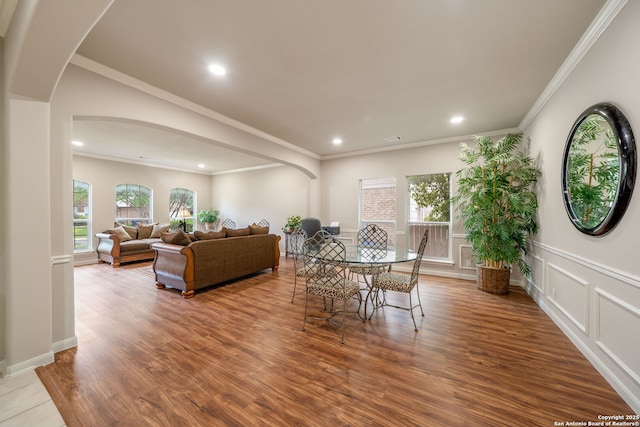 38 Atwell, San Antonio, TX 78254 - dining room with arched walkways, wood finished floors, recessed lighting, and ornamental molding