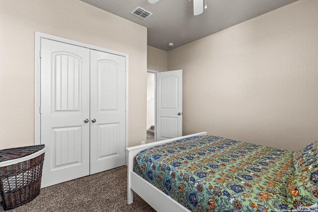 1002 Faith Rnch, San Antonio, TX 78245 - bedroom with carpet flooring, a closet, and a ceiling fan