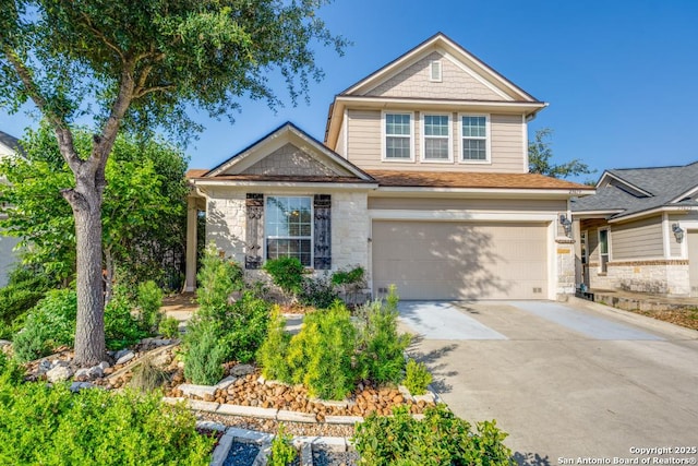 view of front of property with a garage, driveway, and stone siding