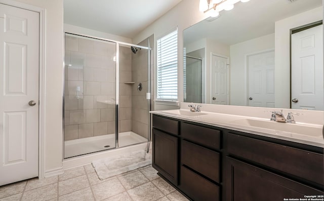 6136 Sunflower, San Antonio, TX 78244 - full bathroom featuring a shower stall and double vanity