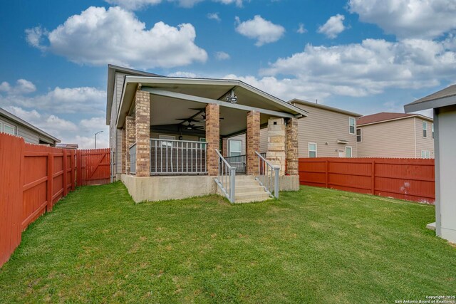 6136 Sunflower, San Antonio, TX 78244 - rear view of property featuring covered porch, ceiling fan, and stone siding