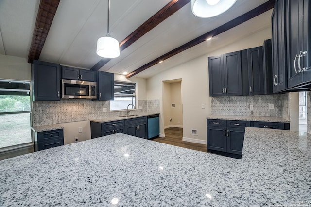 13635 Owl Tree, San Antonio, TX 78253 - kitchen with stainless steel microwave, dishwasher, a sink, and light stone counters