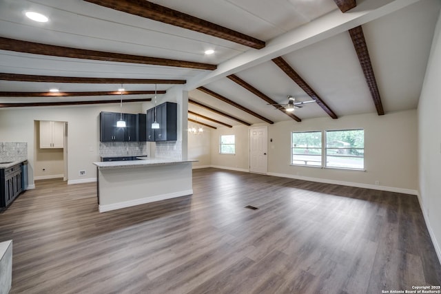 13635 Owl Tree, San Antonio, TX 78253 - unfurnished living room with ceiling fan, dark wood-style flooring, baseboards, recessed lighting, and a chandelier