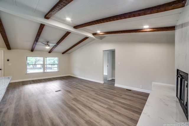 13635 Owl Tree, San Antonio, TX 78253 - unfurnished living room with a ceiling fan, dark wood-style floors, a large fireplace, and baseboards