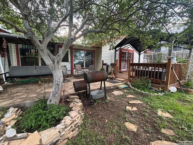 3802 Quiver, San Antonio, TX 78238 - view of yard with a wooden deck and fence