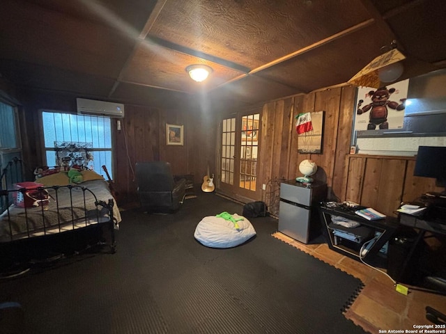 3802 Quiver, San Antonio, TX 78238 - carpeted bedroom with a wall mounted air conditioner, wooden walls, and freestanding refrigerator