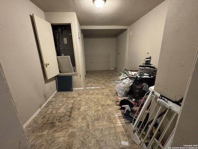 5039 Bayhead, San Antonio, TX 78220 - hall with a textured ceiling and stone finish flooring