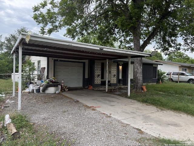 5039 Bayhead, San Antonio, TX 78220 - view of front of property with a carport, driveway, fence, a garage, and covered porch