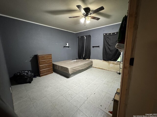5039 Bayhead, San Antonio, TX 78220 - bedroom featuring crown molding, a ceiling fan, a textured ceiling, and tile patterned floors