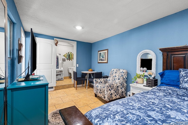 706 El Monte Blvd, San Antonio, TX 78212 - bedroom featuring a textured ceiling and light tile patterned floors