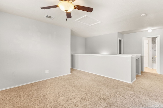 846 Barrel Pt, San Antonio, TX 78251 - empty room featuring attic access, light colored carpet, baseboards, and ceiling fan