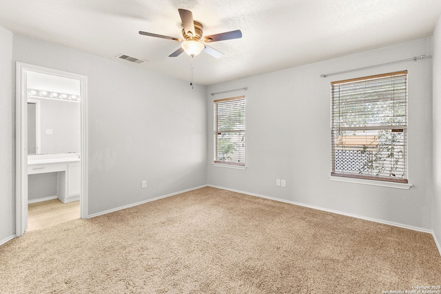 846 Barrel Pt, San Antonio, TX 78251 - unfurnished bedroom with carpet, baseboards, and connected bathroom