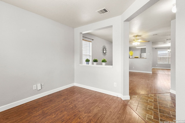 846 Barrel Pt, San Antonio, TX 78251 - empty room featuring ceiling fan, baseboards, and wood finished floors