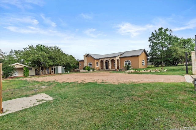 3205 Puter Crk, Spring Branch, TX 78070 - view of front of house with a front lawn and stucco siding