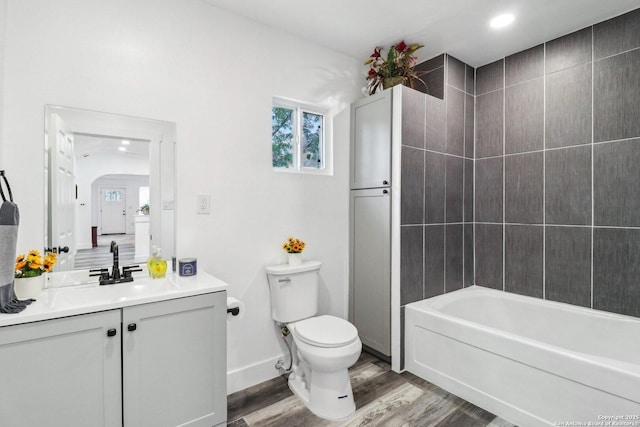 2120 San Fernando, San Antonio, TX 78207 - full bathroom with toilet, wood finished floors, and vanity
