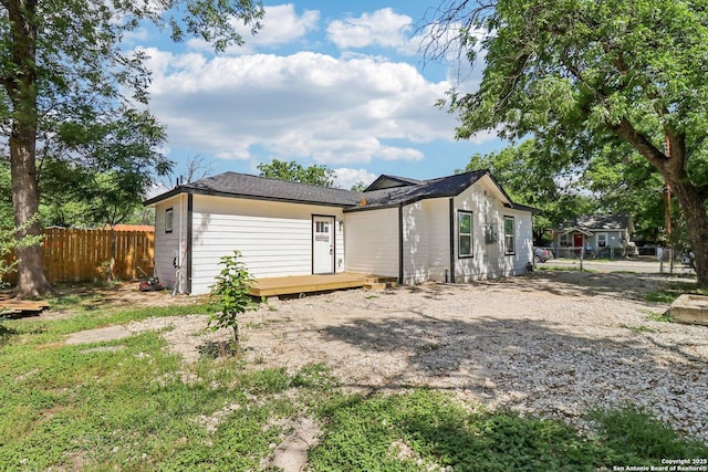 2120 San Fernando, San Antonio, TX 78207 - rear view of house with fence and a wooden deck