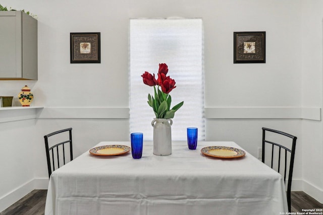 2120 San Fernando, San Antonio, TX 78207 - dining space with dark wood finished floors and baseboards