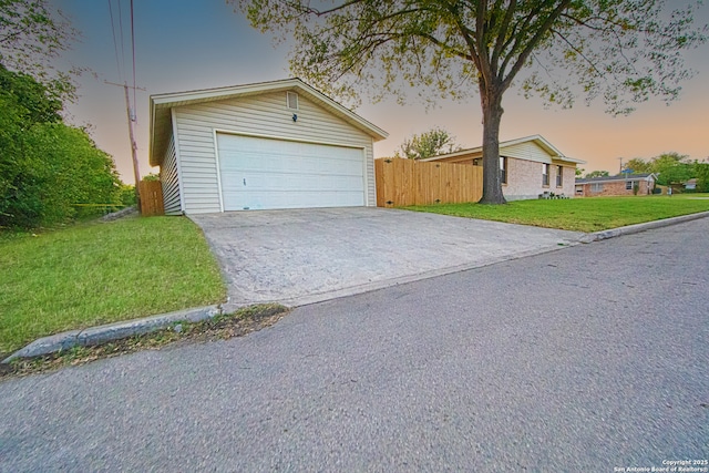 view of front facade with driveway and a garage