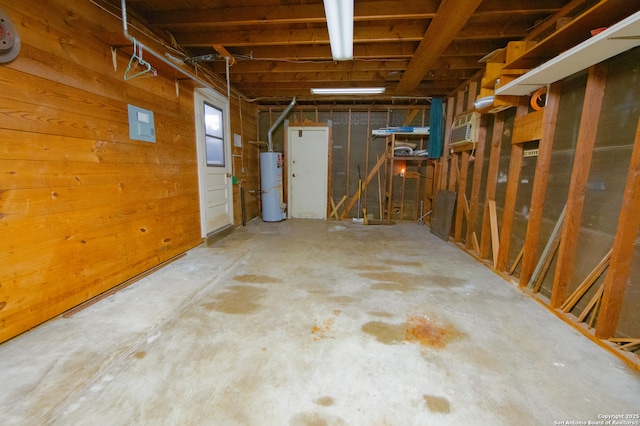 below grade area featuring gas water heater and a garage
