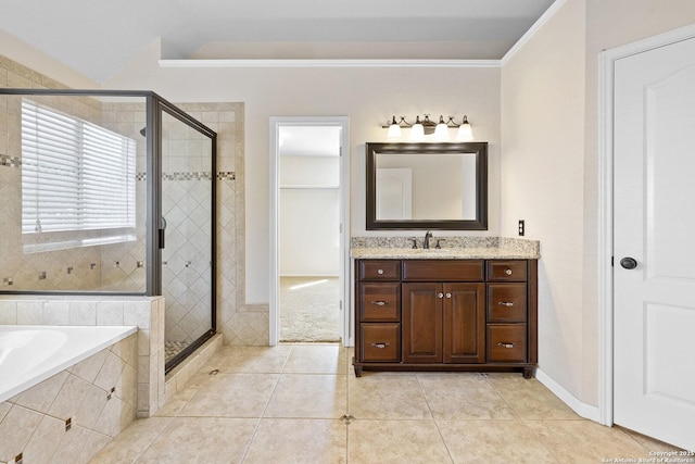 full bath featuring ornamental molding, a shower stall, a bath, vanity, and tile patterned floors