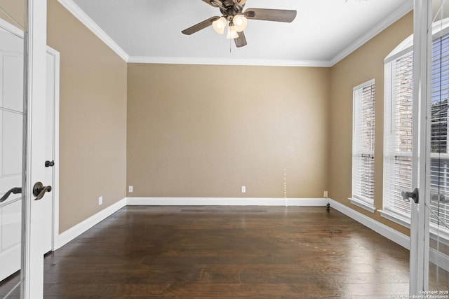 empty room with crown molding, dark wood-type flooring, a ceiling fan, and baseboards