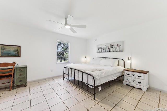 bedroom with light tile patterned floors and ceiling fan