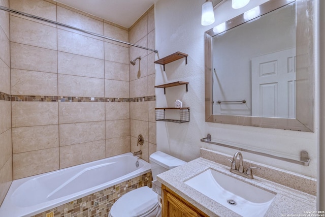 120 W Brazos, Uvalde, TX 78801 - full bath with toilet, tiled shower / bath combo, and vanity
