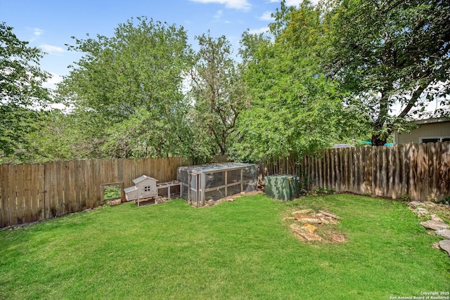 8201 Bluff Bnd, San Antonio, TX 78250 - view of yard featuring exterior structure