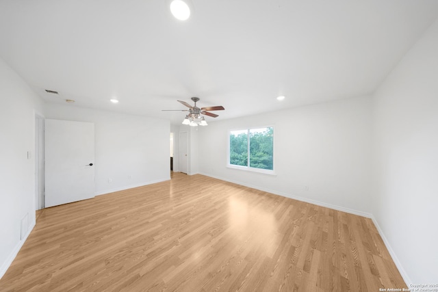 8201 Bluff Bnd, San Antonio, TX 78250 - unfurnished room with light wood-style flooring, baseboards, recessed lighting, and a ceiling fan