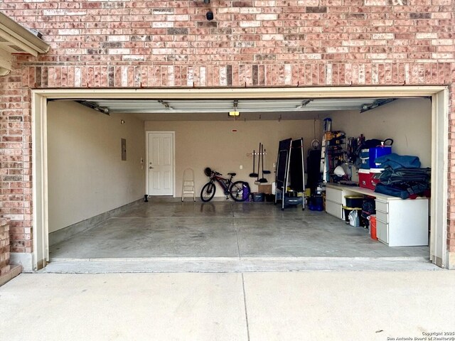 3819 Browning, San Antonio, TX 78245 - garage featuring concrete driveway