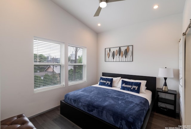 225 S Pine Unit 101, San Antonio, TX 78203 - bedroom featuring wood finished floors, recessed lighting, lofted ceiling, a barn door, and a ceiling fan