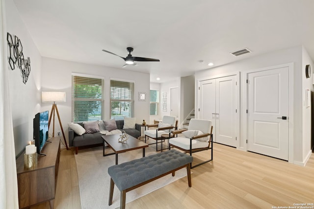 1102 S Gevers St, San Antonio, TX 78210 - living room featuring light wood-style flooring, a ceiling fan, stairs, recessed lighting, and baseboards