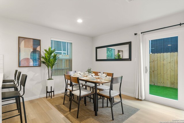 1102 S Gevers St, San Antonio, TX 78210 - dining room featuring light wood-type flooring, baseboards, and recessed lighting
