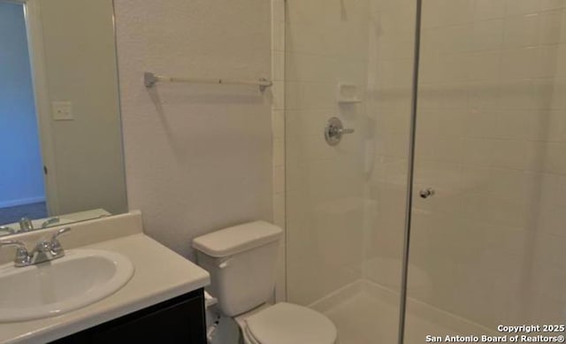 7374 Braes Cor, San Antonio, TX 78244 - full bath featuring tiled shower, toilet, and vanity
