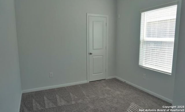 7374 Braes Cor, San Antonio, TX 78244 - empty room with carpet and baseboards
