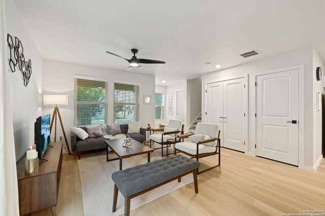1108 S Gevers St, San Antonio, TX 78203 - living room featuring light wood-style flooring, a ceiling fan, stairs, recessed lighting, and baseboards