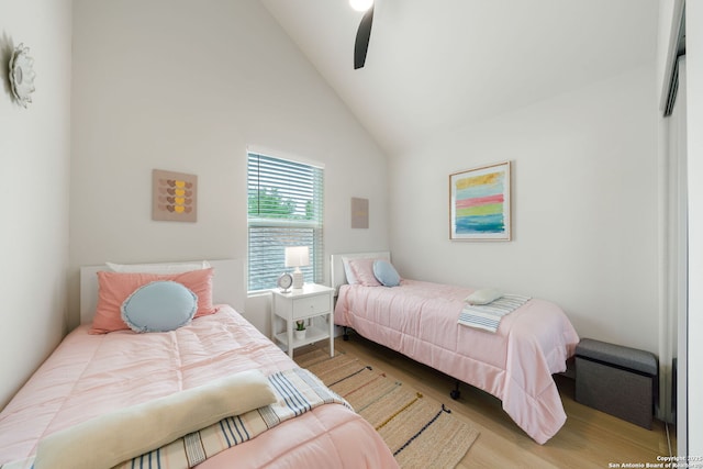 1108 S Gevers St, San Antonio, TX 78203 - bedroom featuring wood finished floors, ceiling fan, and high vaulted ceiling