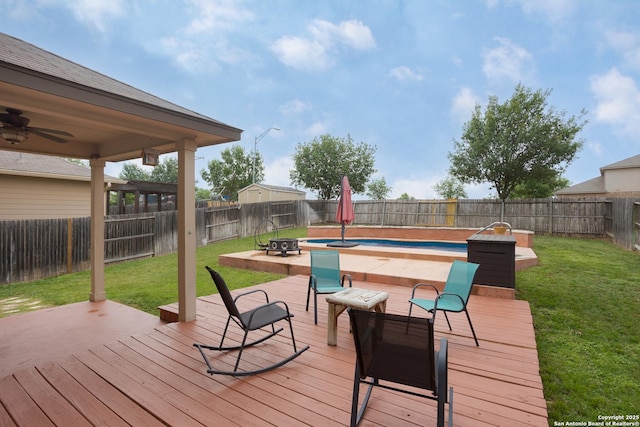 1026 Dogleg Right, San Antonio, TX 78221 - wooden terrace featuring an outdoor fire pit and a ceiling fan