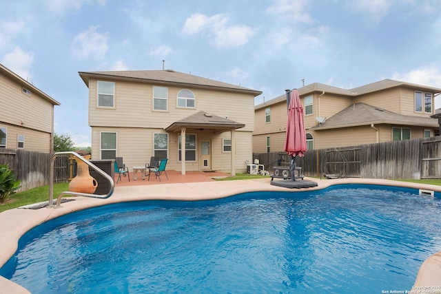 1026 Dogleg Right, San Antonio, TX 78221 - view of swimming pool featuring a patio area and a fenced backyard