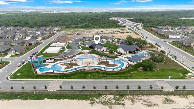 13927 Borolanite, San Antonio, TX 78253 - aerial view of property and surrounding area featuring a pool, nearby suburban area, and a forest