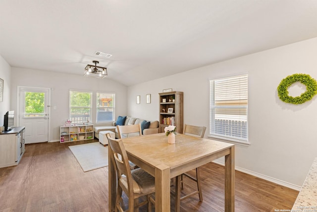 13927 Borolanite, San Antonio, TX 78253 - dining room with light wood-style floors, baseboards, and lofted ceiling