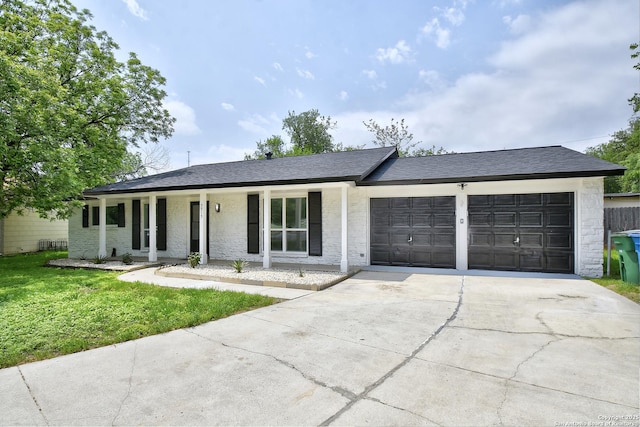 5515 Rolling Rdg, San Antonio, TX 78228 - single story home with concrete driveway, a garage, a front lawn, covered porch, and roof with shingles