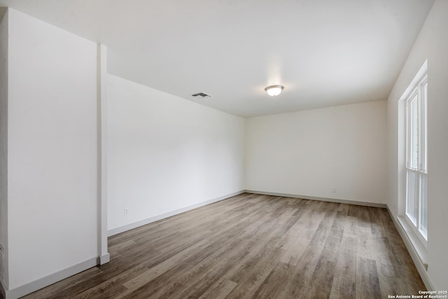 5515 Rolling Rdg, San Antonio, TX 78228 - unfurnished room with wood finished floors and baseboards