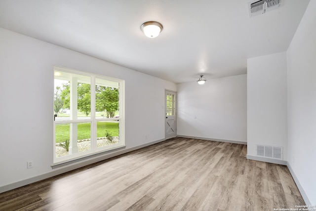 5515 Rolling Rdg, San Antonio, TX 78228 - spare room featuring wood finished floors and baseboards
