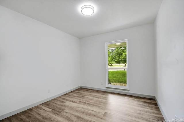 5515 Rolling Rdg, San Antonio, TX 78228 - spare room featuring wood finished floors and baseboards