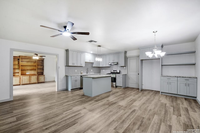 5515 Rolling Rdg, San Antonio, TX 78228 - kitchen with appliances with stainless steel finishes, gray cabinets, a ceiling fan, light countertops, and light wood-style floors
