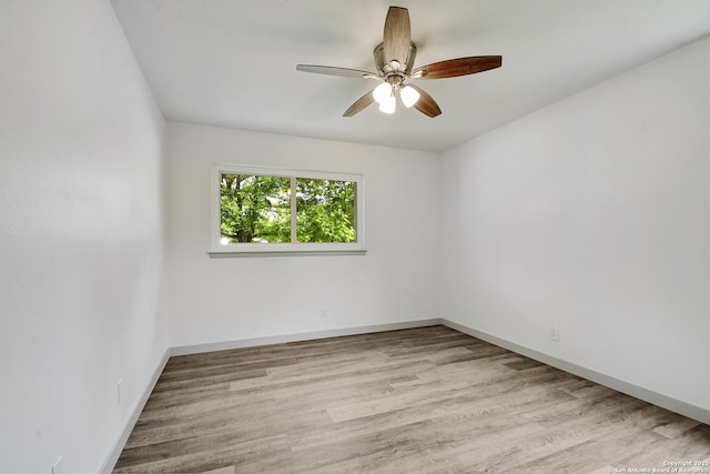 5515 Rolling Rdg, San Antonio, TX 78228 - spare room with a ceiling fan, wood finished floors, and baseboards